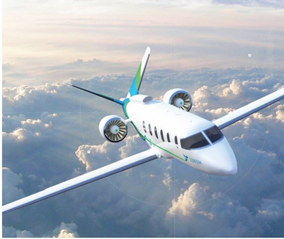 A business jet in flight above the clouds