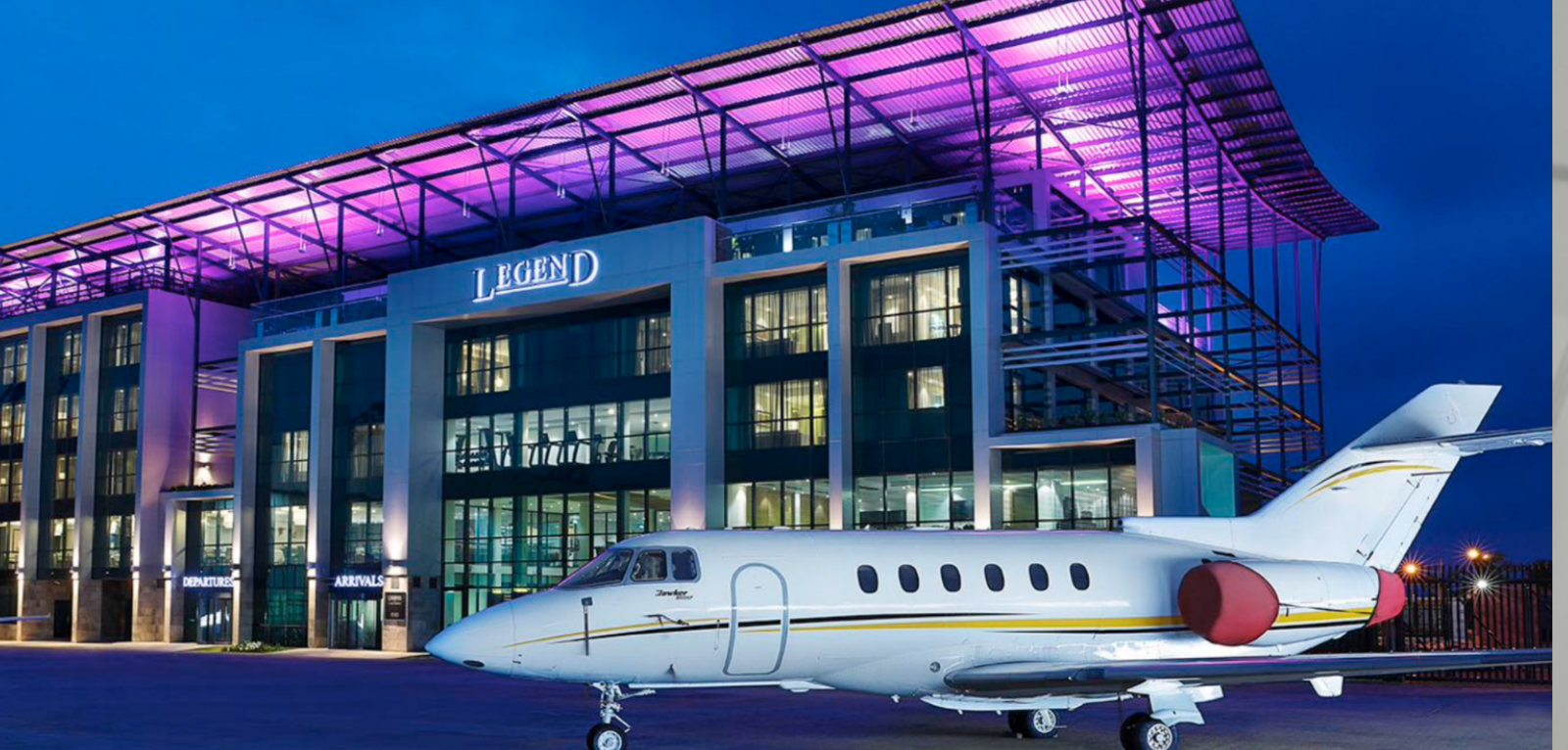 A private jet parked before the Quits private terminal at night, Lagos